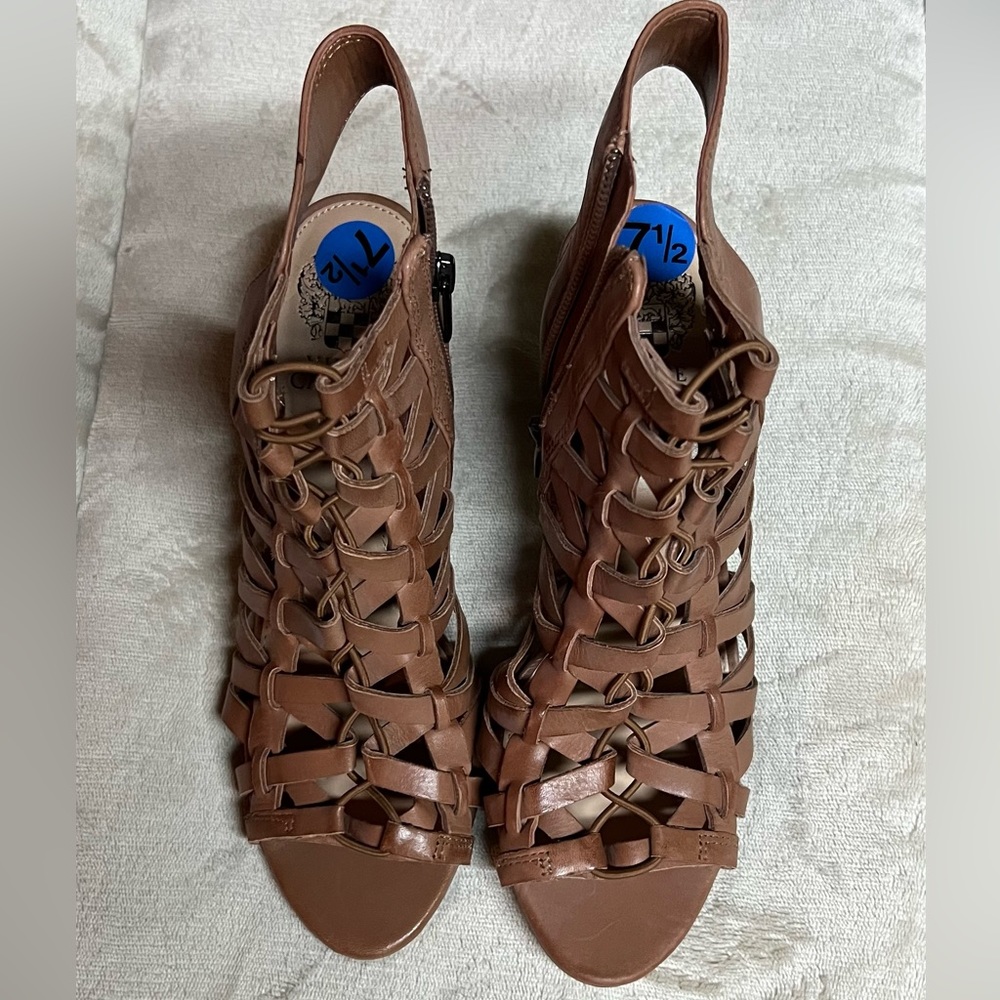 Brand new Vince Camuto cognac brown caged heels with zipper. Size 7.5